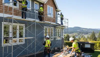 Portland, OR siding contractor installing vinyl siding for a home exterior improvement project